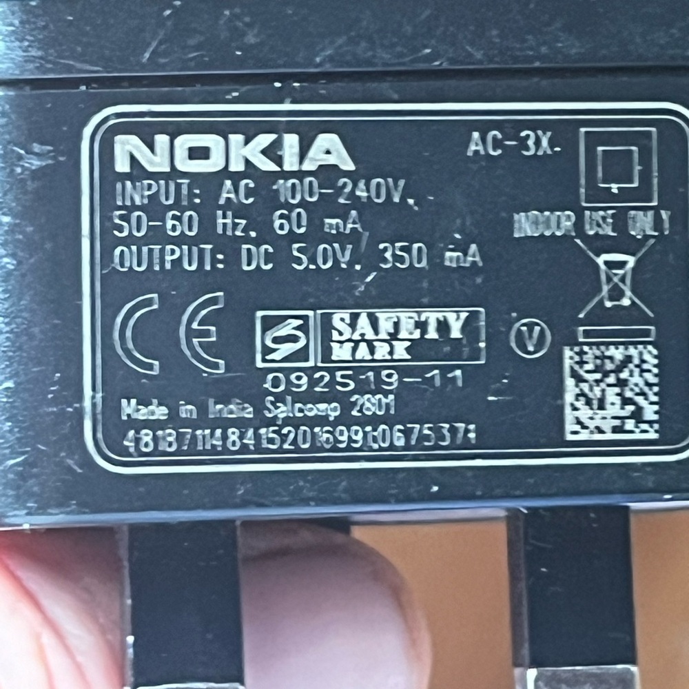 Nokia AC-3X Foreign Travel Cell Phone Charger
INPUT: 100-240V AC
OUTPUT: 5V DC